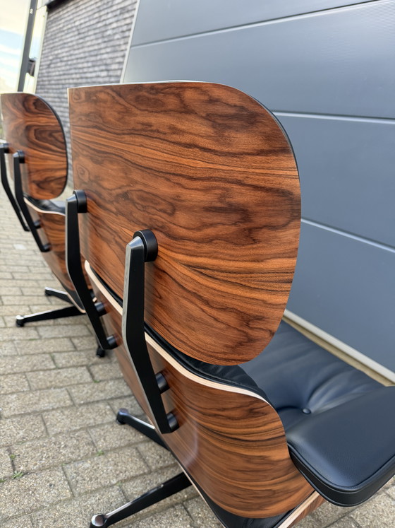 Image 1 of 2 poltrone lounge Vitra Eames XL originali con poggiapiedi, in pregiata pelle nera e palissandro Santos, NUOVE!!