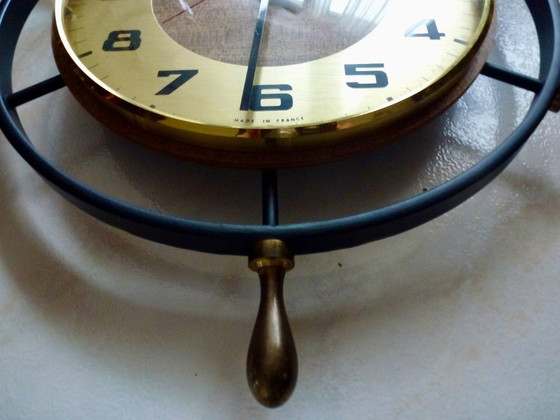 Image 1 of  Vintage "Bayard" klok in de vorm van een scheepsroer.