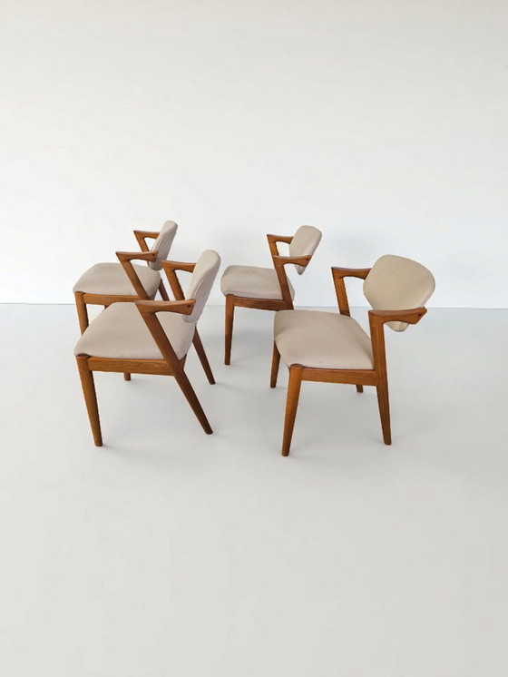 Image 1 of Lot de 4 chaises à accoudoirs en teck Chaises de salle à manger Chaises Kai Kristiansen Modèle 42