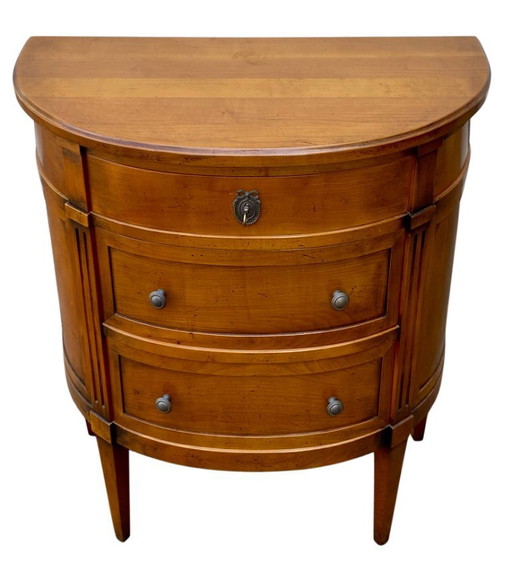 Louis XVI style cherrywood three-drawer half-moon commode