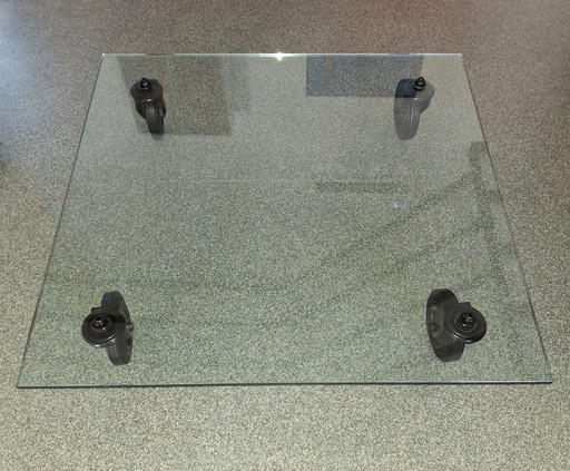 Fontana Arte tavola con ruote 120x120