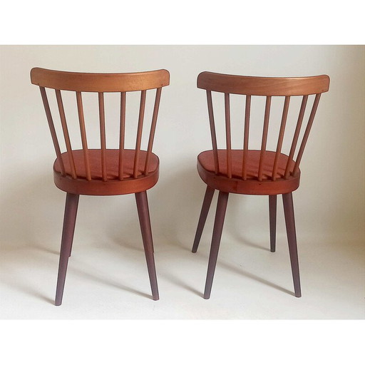 Pair of vintage model 740 chairs in beech and red leatherette for Baumann, 1950