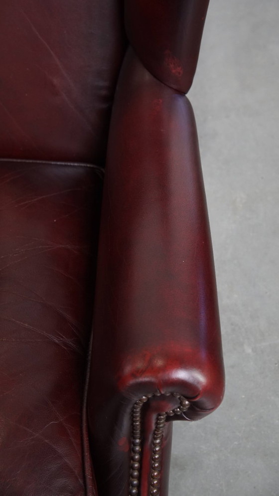 Image 1 of 2x Bordeauxrode rundleren oorfauteuils in Engelse stijl