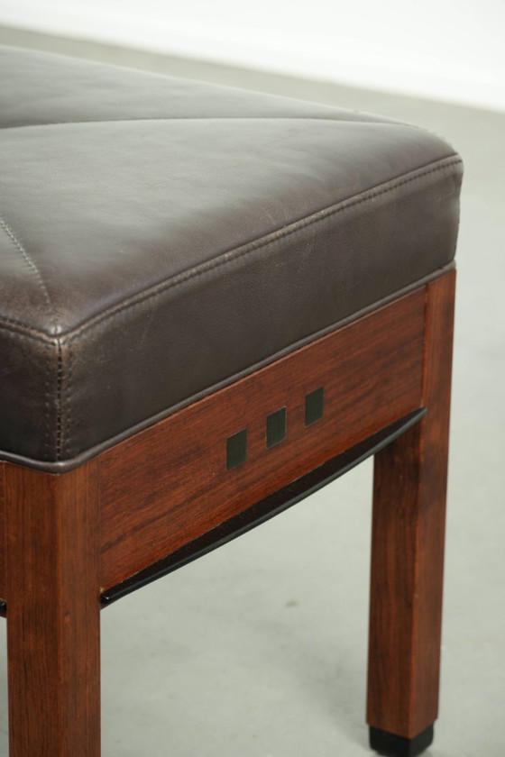 Image 1 of Chocolate brown cowhide Schuitema Art Deco design ottoman/footstool from the Decoforma series