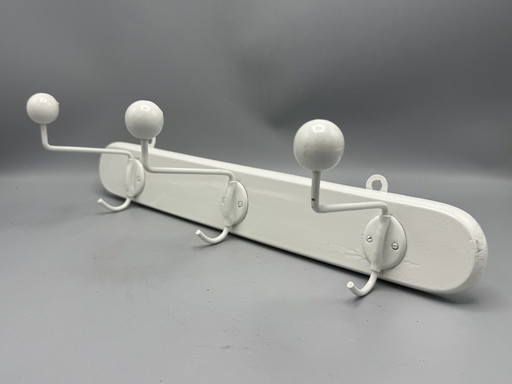 Mid - Century coat rack sleek and timeless design