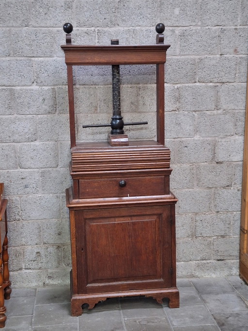 Antique oak linen press
