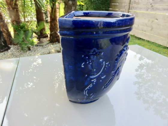 Image 1 of Wall-mounted flower pot, grape motif, in blue glazed ceramic, 1970s