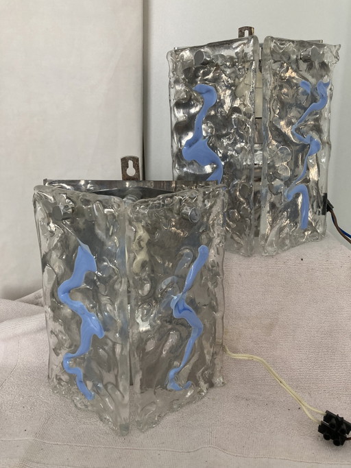 Pair of wall sconces in clear Murano glass enhanced with sky blue – wandlampen, Metal
