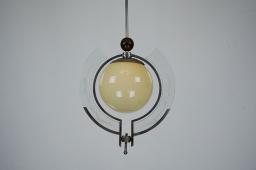 Lampada a sospensione Art Déco italiana degli anni '30 con vetro inciso e globo color ambra.