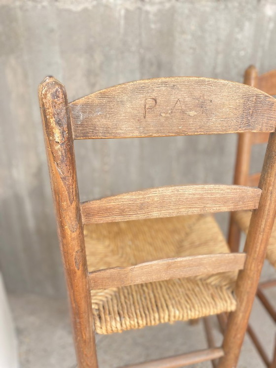 Image 1 of Set di 2 sedie autentiche con schienale a pioli e seduta in giunco ​​– atmosfera rustica/mediterranea