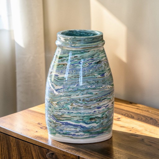 Unique handcrafted vase in turquoise mixed clay