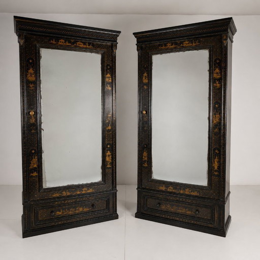 A pair of 19th-century Chinoiserie-style linen cupboards/wardrobes.
