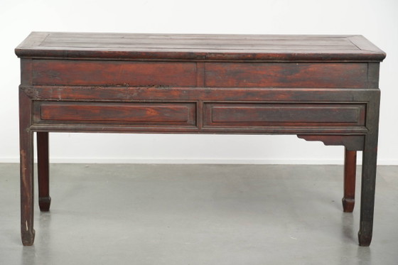 Image 1 of Antique wooden Chinese sideboard from the late 19th century in a beautiful red color with exquisite wood carving.
