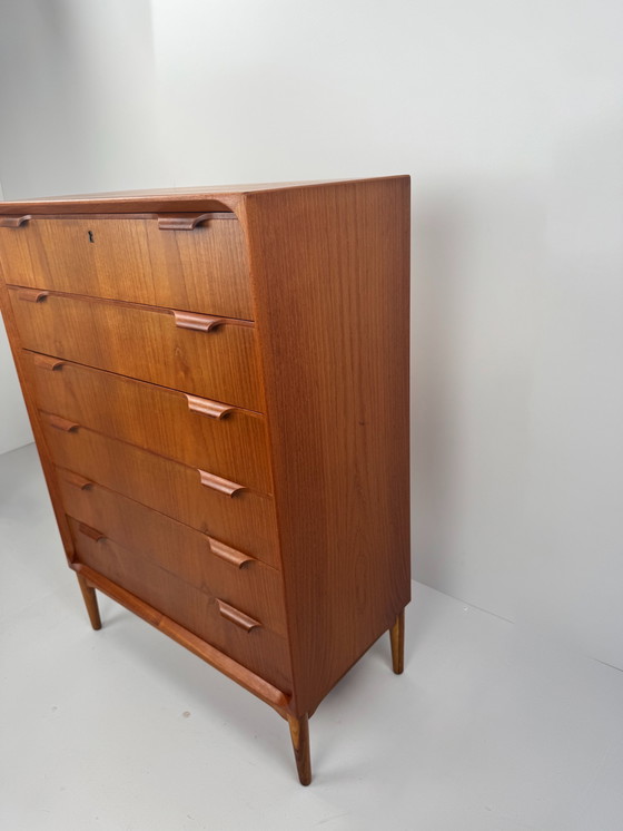 Image 1 of Scandinavian Mid-Century Teak Chest of Drawers – Elegant Sculpted Details