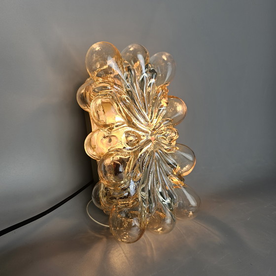 Image 1 of Vintage glass bubble wall lamp by Glashutte Limburg. Design by Helena Tynell. Glass and brass. 1960, Germany.