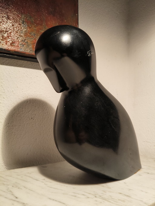 Vintage design modernist black marble sculpture of a stylized abstract bird on a white marble base