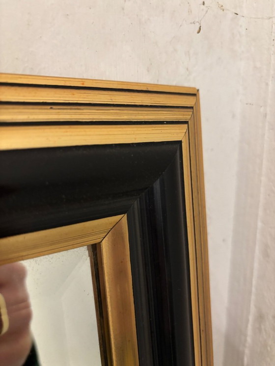 Image 1 of Grote wandspiegel – zwart/gouden lijst – Louis Philippe / Hollywood Regency stijl