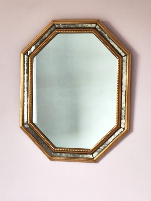 Antique mirror with gilded wood and parcloses