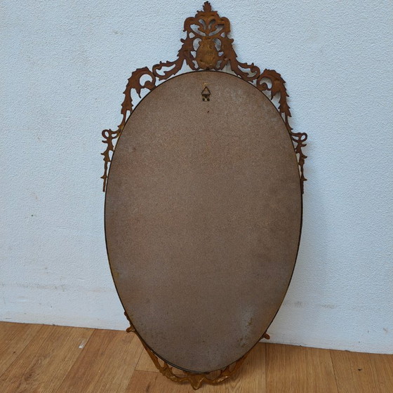 Image 1 of Vintage Goudkleurige Ovale spiegel kuifspiegel schouwspiegel. Koper 