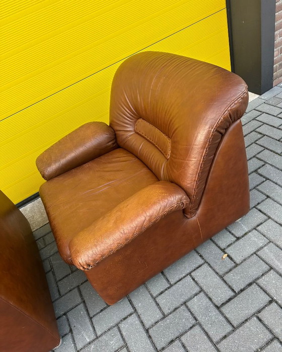Vintage brown leather Danish lace Armchairs 70s (photo 13 of 21)