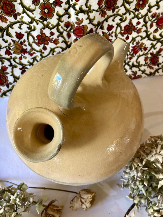 Image 1 of Gargoulette en terre cuite émaillée jaune