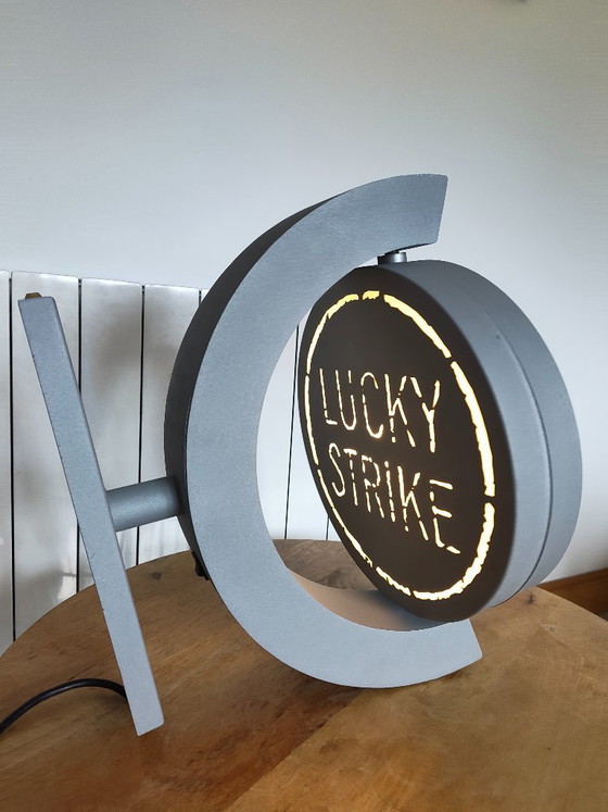 Image 1 of Vintage draaiend lichtreclamebord Lucky Strike
