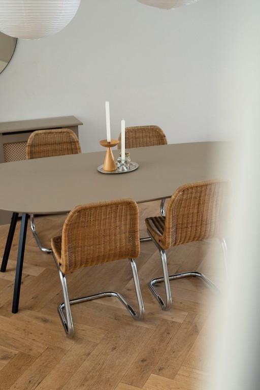 set van 4 rotan sledestoelen gemaakt door Dirk Van Sliedregt voor Gebroeders Jonkers Noordwolde, Nederland.