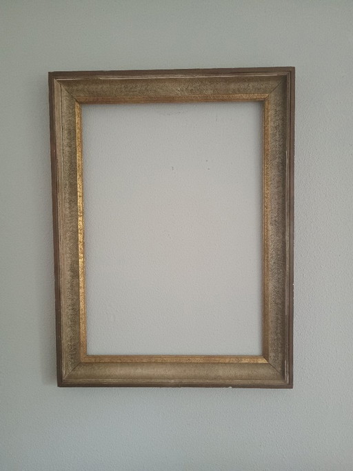 Large gold-colored frame