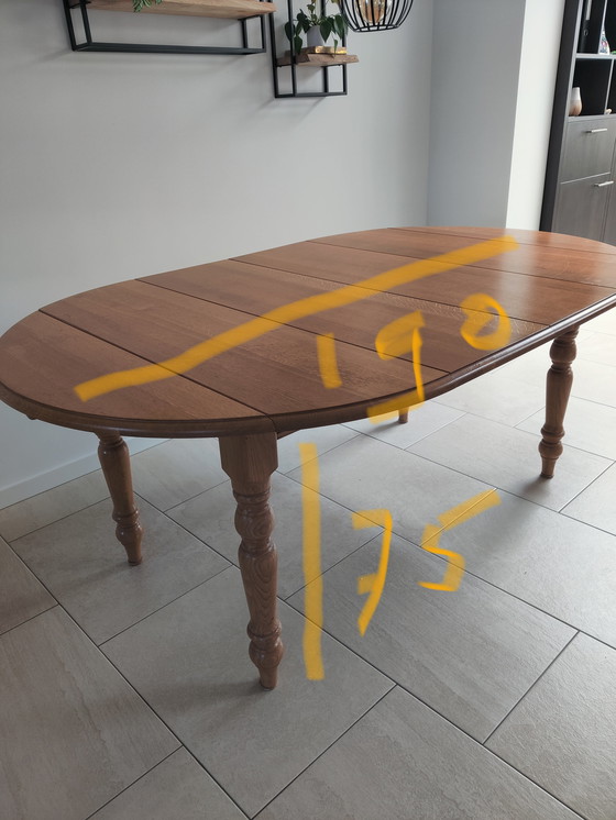 Image 1 of In large adjustable oak table