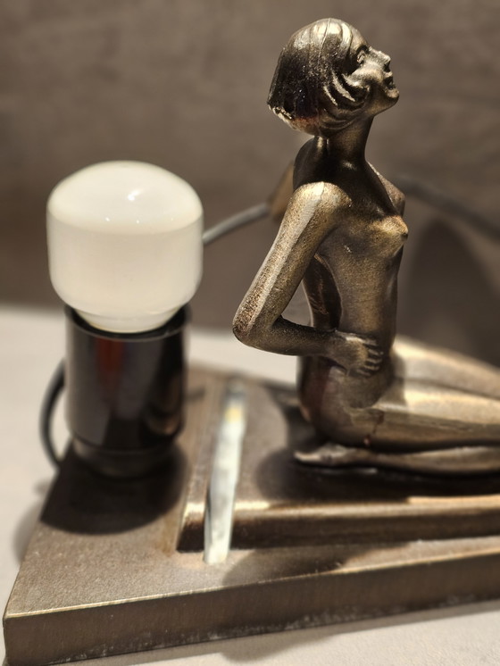 Image 1 of Art Deco lamp MCM 1960, probably bronze with Tiffany style glass shade.