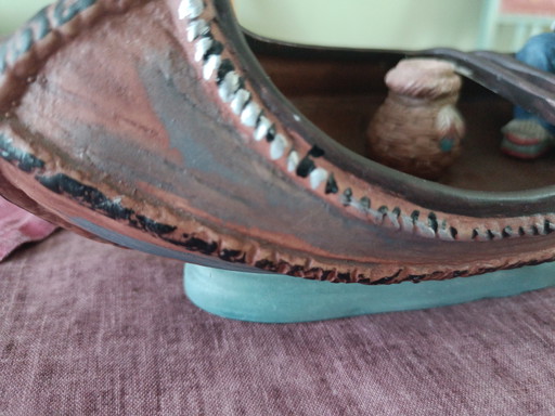 An Indian in canoe