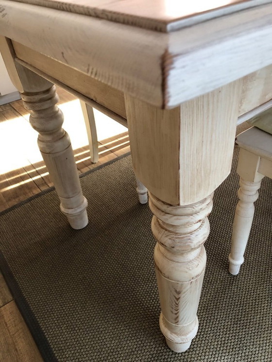 Image 1 of Solid, handcrafted wooden table with 4 matching chairs – antique look