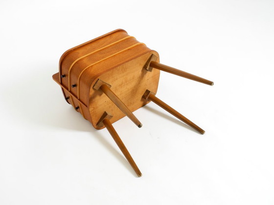 Image 1 of Prachtige originele teakhouten naaidoos uit het midden van de 20e eeuw met scharnierende vakken.