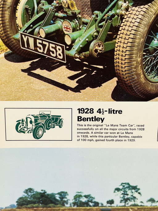 Cardboard photo of two English cars