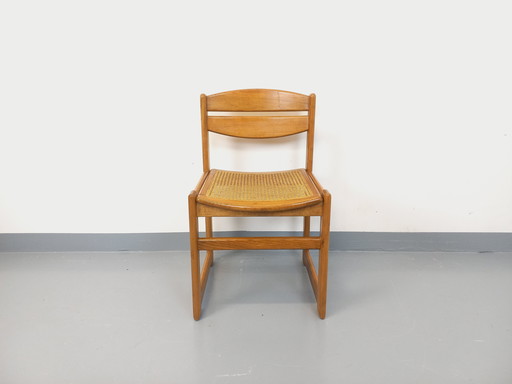 Vintage sled chair in beechwood and cane from the 70s and 80s