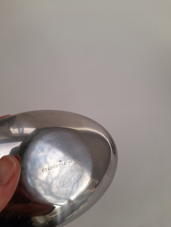 Image 1 of Een paar kiezelvormige kandelaars van Nuance.