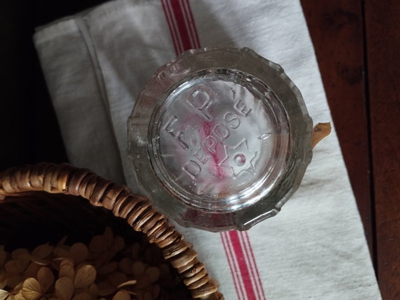 Image 1 of Félix Potin glass jam jar with paper label, 1950s