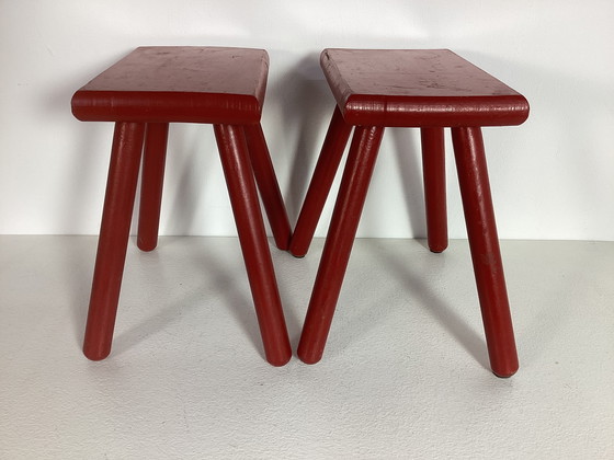 Image 1 of Two red vintage wooden stools side tables