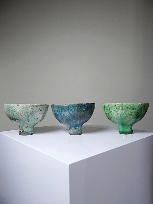 Trio of small vintage raku footed bowls