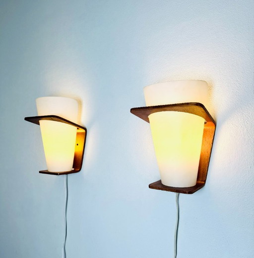 NX41 wood and curved glass wall lamps by Louis Kalff for Philips, the Netherlands, 1950s