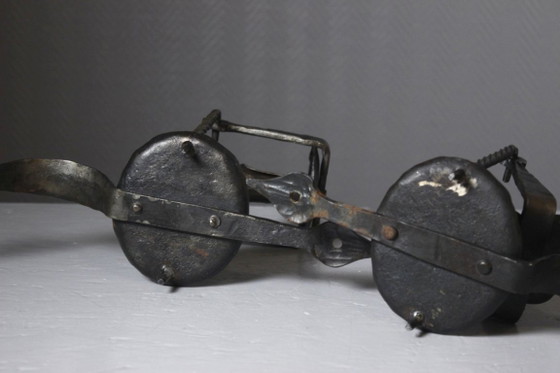 Image 1 of Pair of wrought iron castle-style wall sconces with candles, mid-20th century