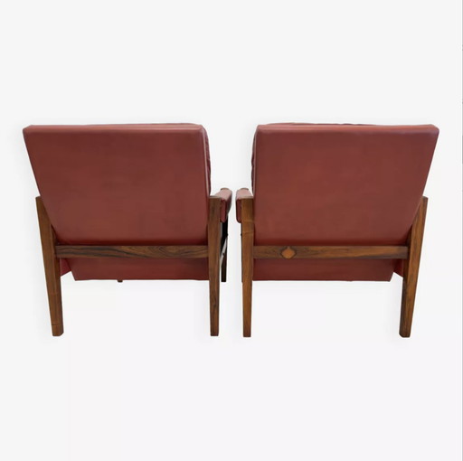 Vintage Deense loungestoelen in rozenhout en leer. 1960s.