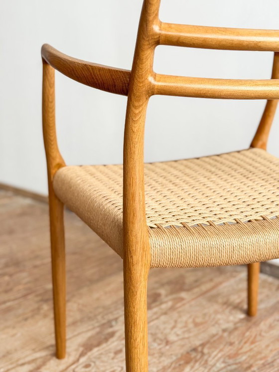 Image 1 of Esszimmerstuhl mit Armlehnen aus Eichenholz, Modell 62 für J.L. Moller