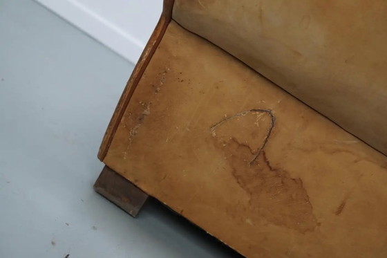 Image 1 of Ein Paar französischer cognacfarbener Ledersessel mit schnurrbartförmigen Rückenlehnen, 1940er Jahre