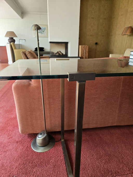 Glass side table, sleek design, metal frame
