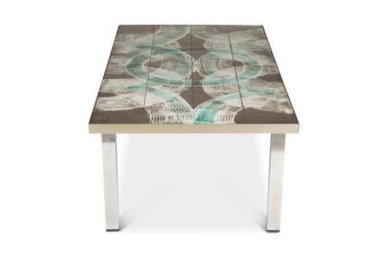 Image 1 of Coffee table with ceramic and chrome-plated top. Circa 1970.