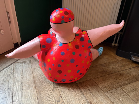 Image 1 of Lady in an orange dress by Trijnie Wubbolt