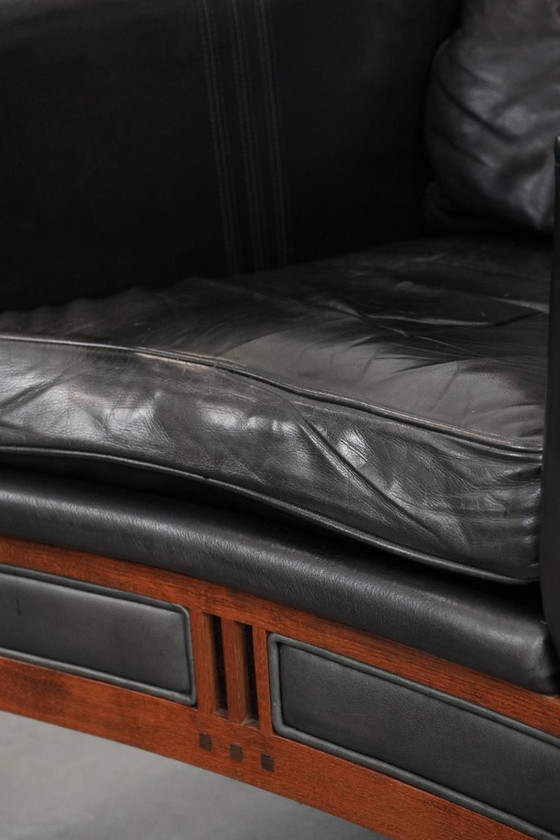 Image 1 of Black cowhide and wooden Art Deco design armchair by Schuitema from the Decoforma series with decorative cushion