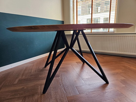 Image 1 of Studio Henk Round Dining Table 160cm Oak with Black Metal Butterfly Base