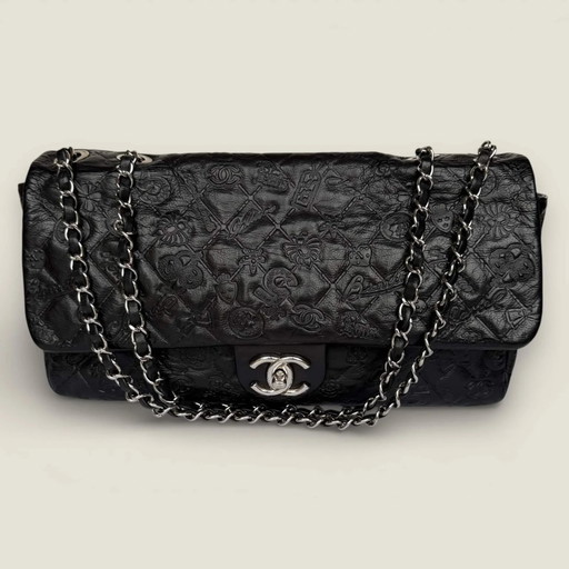 Chanel jumbo piel de becerro repujada símbolos de la suerte